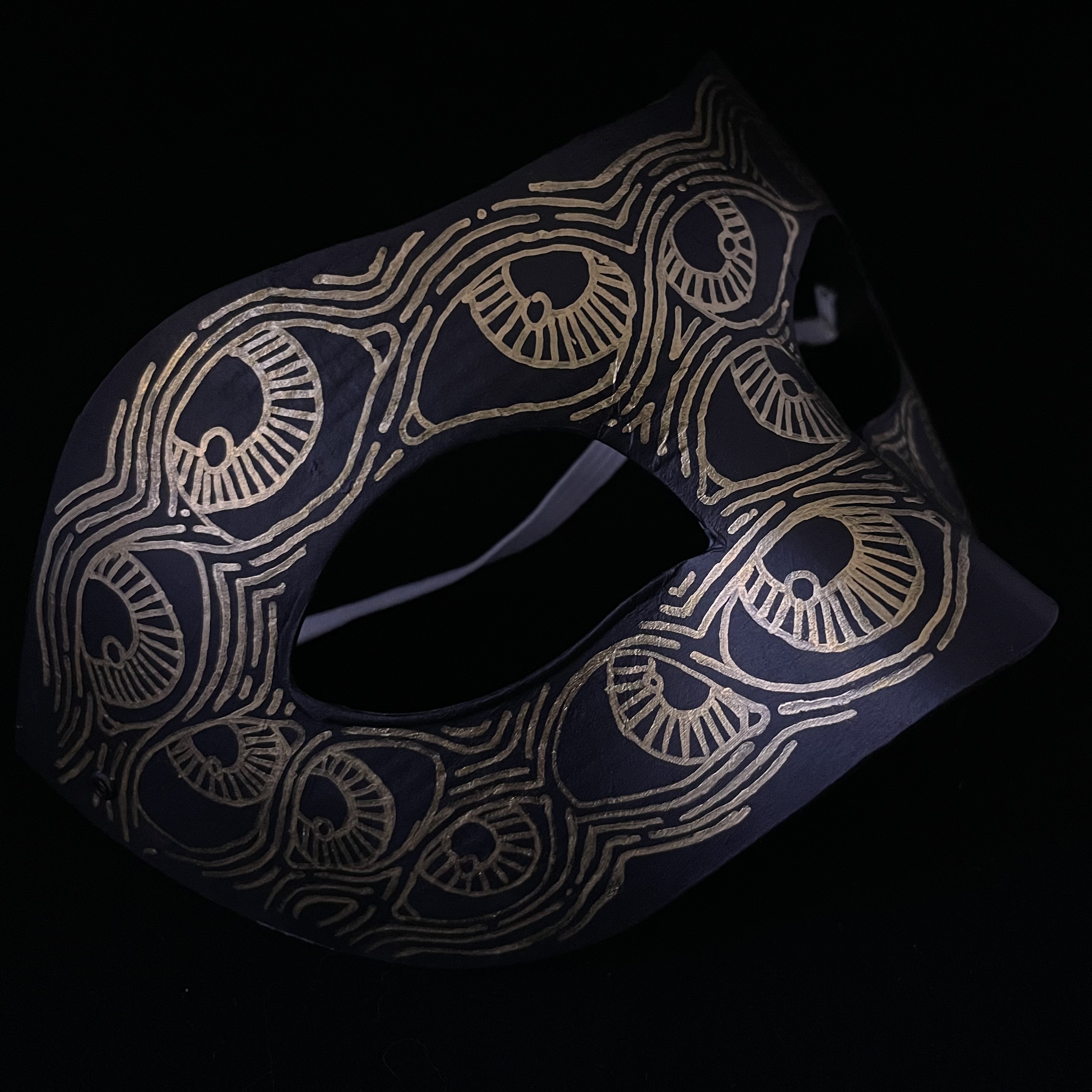 mask with lots of eyes