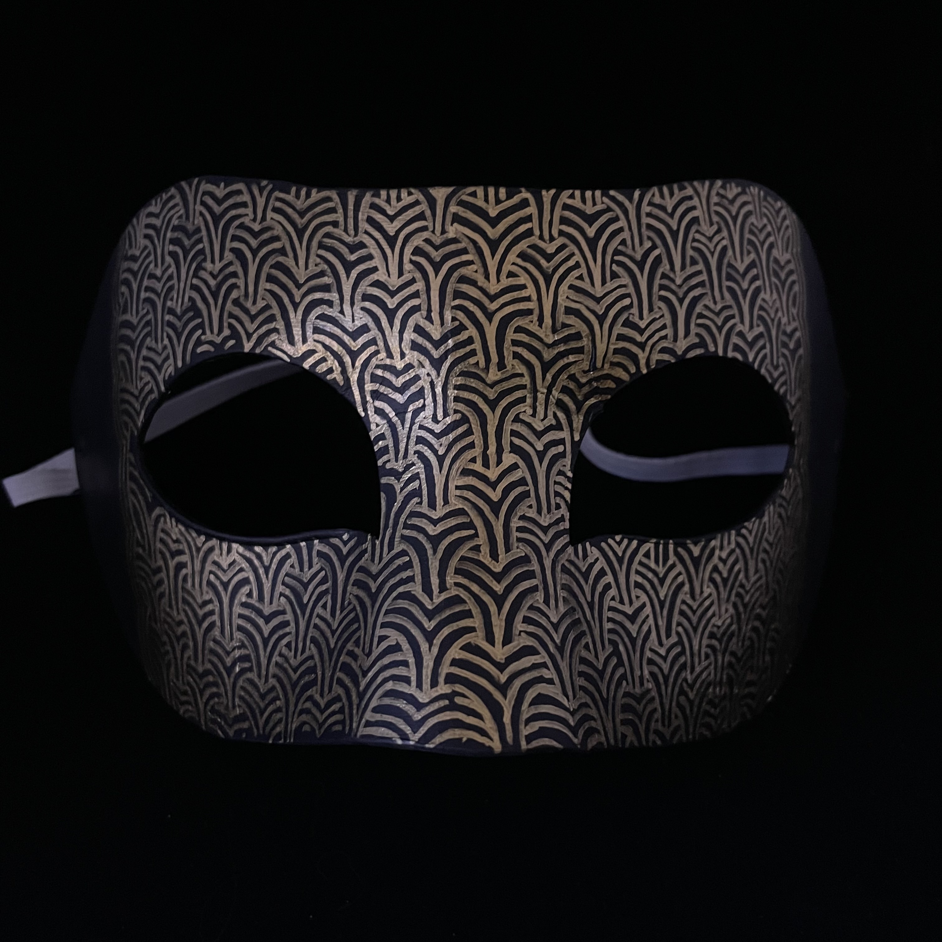 mask with architectural pattern